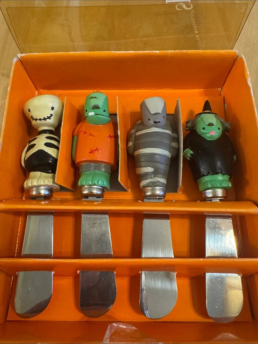 Set of 4 Festive stainless steel Ghosts & Goblins cheese/butter spreader set